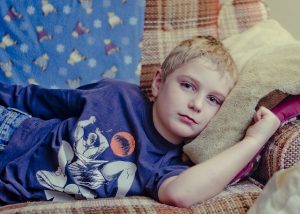 Boy sofa tired unwell_childhood cancers_oncology news australia