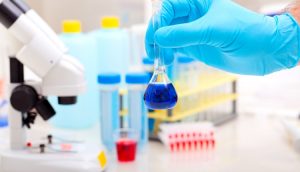 Chemistry research acid flask concept_oncology news australia