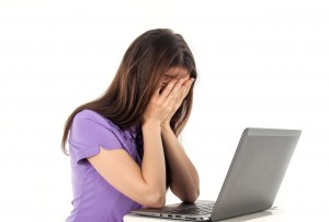 Work after cancer computer woman tired anxiety_oncology news australia