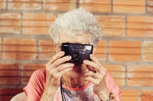 camera meaning older woman viewing life through a lense_oncology news australia