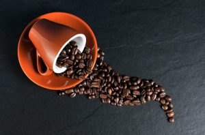 coffee cup and beans slate background_oncology news australia