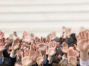 crowd of hands_patient selection concept_oncology news australia_800x500