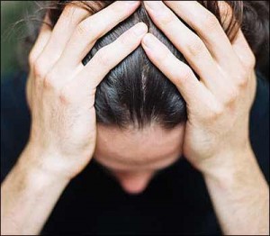 head in hands guilt concept_oncology news australia