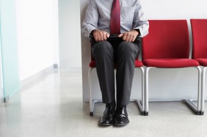 man in waiting room_oncology news australia
