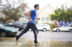 man jogging fitness app device_oncology news australia