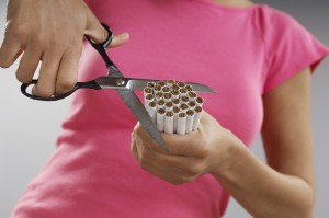 woman cutting cigarettes_oncology new australia