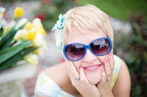 woman happy smiling optimistic outdoors sunglasses_oncology news australia