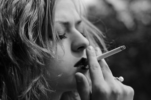 woman smoking bw