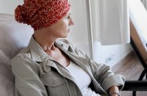 woman with cancer looking away_oncology news australia