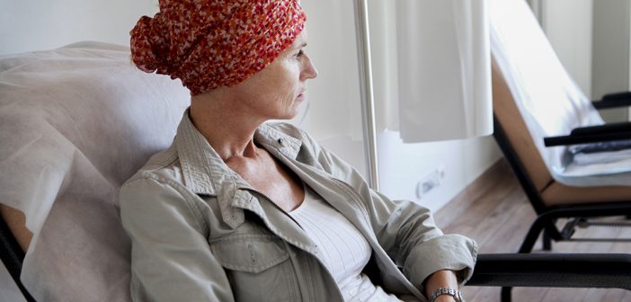 woman with cancer looking away_oncology news australia